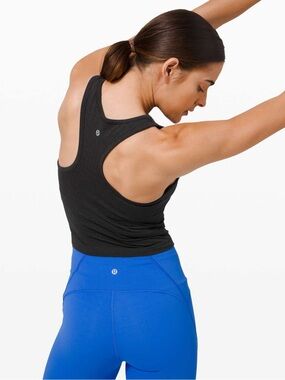 Lululemon Ebb To Street Racerback Crop Tank
Black size 12 ribbed built in bra